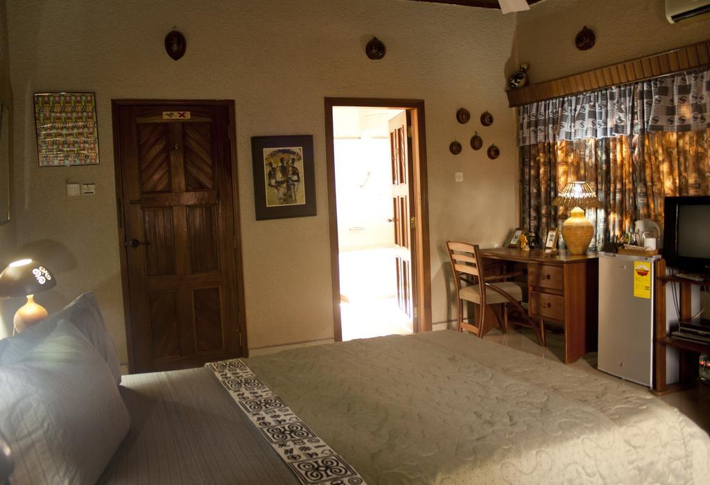 Four Villages Inn Кумасі Номер фото