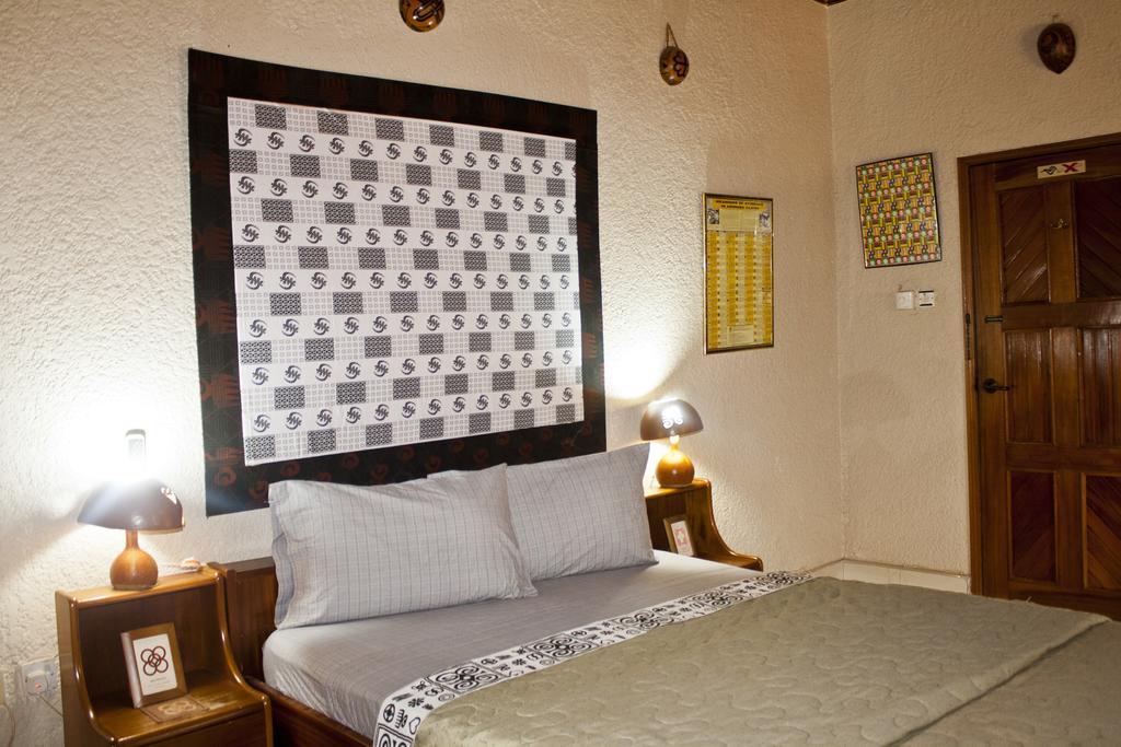 Four Villages Inn Кумасі Номер фото