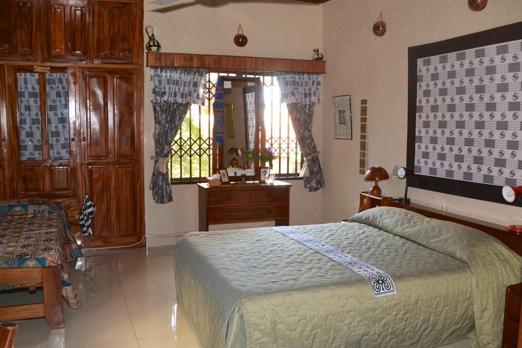 Four Villages Inn Кумасі Номер фото